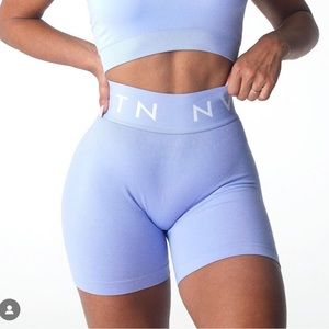 NVGTN shorts size Medium in color Periwinkle. Brand new never worn with tags.